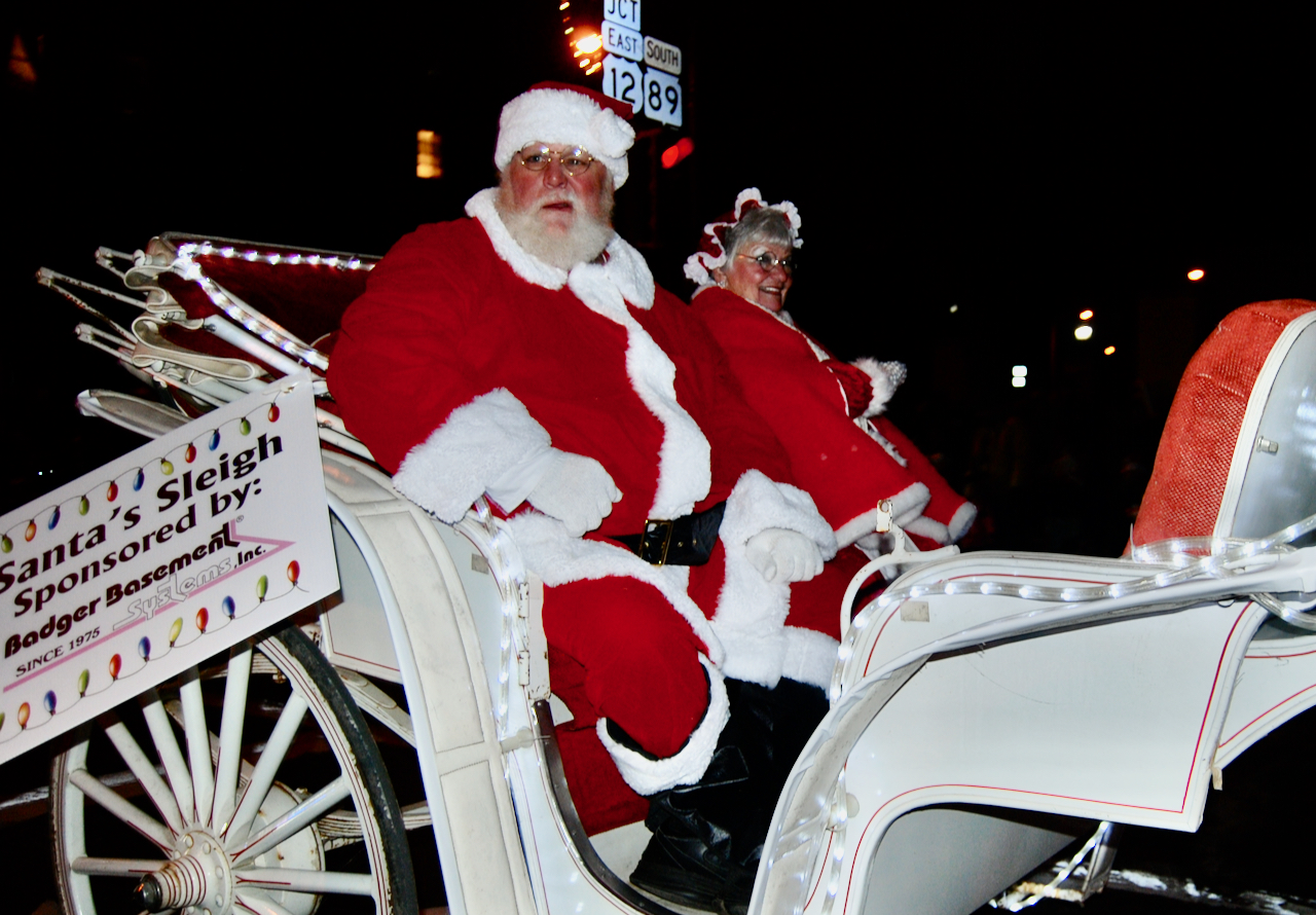 Holiday parade packs streets, lights Fort