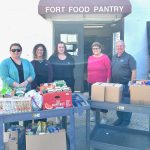 Through donations and matching funds, PremierBank contributes $3,000 to benefit local food collection organizations 